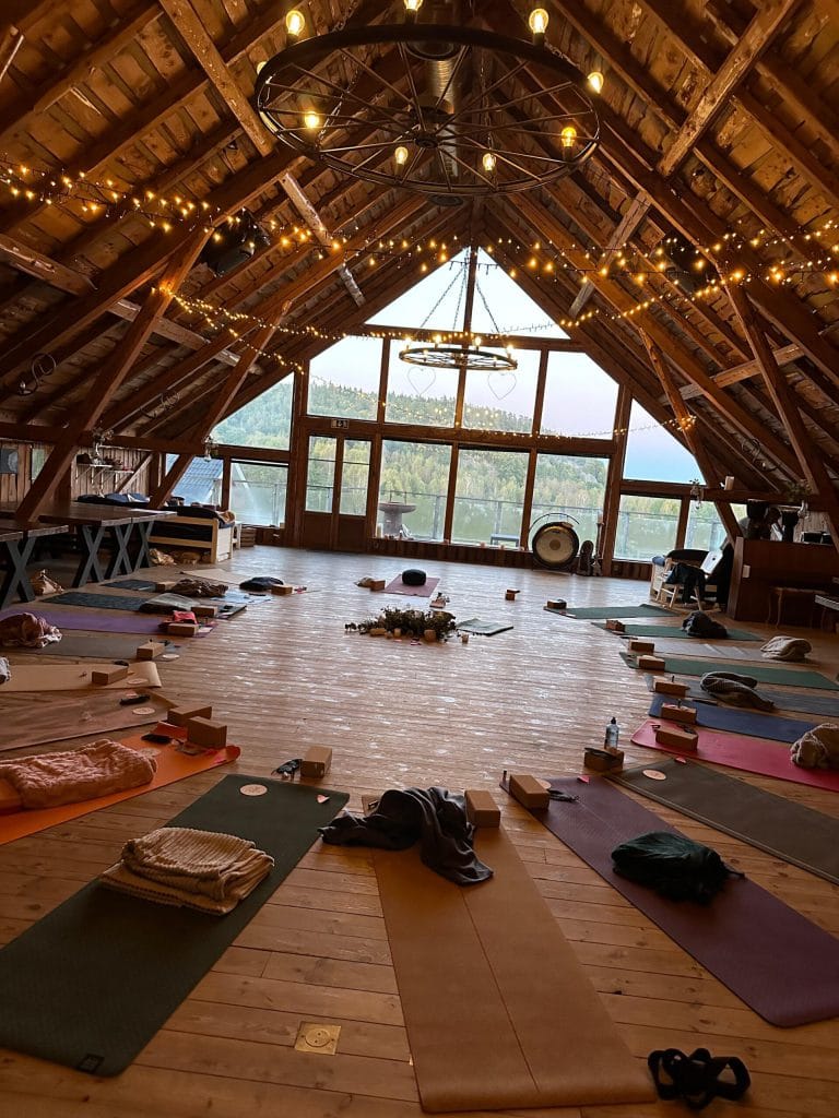 Yoga mats in the hall overlooking the lake